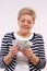 Happy senior female counting polish currency money, concept of financial security in old age