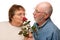 Happy Senior Husband Giving Red Rose to Wife