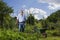 Happy Senior Man In Allotment