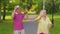 Happy senior stylish couple family grandmother grandfather enjoying date, dancing in summer park