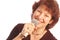 happy senior woman singing Microphone in hand