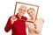 Happy seniors couple in picture frame