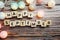 Happy September alphabet letter with LED Cotton ball Decoration on wooden background