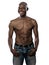 Happy shirtless fit Afro American mature man