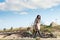 Happy Shopping: Woman walking under blue sky