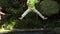 Happy siblings jumping on trampoline