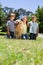 Happy siblings with their dog