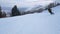 Happy skier having fun skiing backcountry on a sunny winter day in snowy mountains. Extreme freeride skier riding fresh