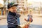 Happy smiling boy on balance swing. children playing at city playground. copy space