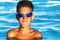 Happy smiling boy in water glasses in the pool. close-up portreit