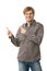 Happy smiling casual man pointing cutout