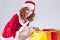 Happy Smiling Caucasian Ginger Santa Helper Girl with Colorful Shopping Bags