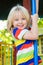 Happy, smiling child playing in a play ground