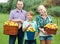 Happy smiling family with apples