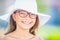 Happy smiling girl with dental braces and glasses.  Orthodontist and dentist concept