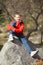 Happy smiling hiker boy with backpack