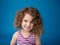 Happy Smiling Laughing Child: Girl with Curly Hair