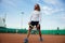 Happy smiling male tennis player ready for morning workout on outdoor court