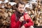 Happy smiling man drinking hot tea outdoor - winter countryside landscape