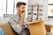 happy smiling man with open parcel box at home