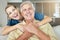 A happy smiling man and woman showing the bond between patient and doctor during a checkup at home. A doctor showing