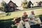 Happy smiling mature couple having picnic together