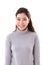 Happy, smiling woman with grey sweater