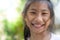 Happy smily face Asian girl with bokeh background.