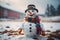 Happy snowman dressed in warm Christmas clothing