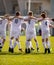 Happy Soccer Players. Happy Boys Winning Soccer Match. Young Successful Soccer Football Players Dancing Together