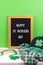 Happy St. Patricks Day letterboard with festive accessories