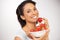 Happy, strawberries and portrait of woman in a studio for wellness, nutrition and organic diet. Smile, vitamins and