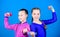 Happy strong children with barbell. workout of strong small girls hold dumbbell. weight lifting for muscules. Fitness