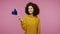 Happy student girl afro hairstyle in hoodie waving European Union flag and smiling, cheering democratic laws