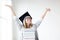 Happy student in graduation cap