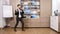 Happy and successful businessman dancing in the office