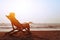 Happy summer beach holidays, woman relaxing in deckchair, tropical vacation