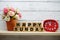 Happy Sunday wooden letter alphabet with decorate item on wooden background