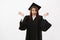 Happy surprised girl graduate gesturing looking at camera over white background.