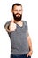 Happy Tattooed bearded man with thumbs up gesture
