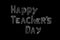 Happy Teacher's day - white inscription on a black board, handdrawn typography poster. Vector illustration