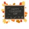 Happy teachers day banner. White lettering on black dashboard in wood frame, yellow red maple