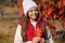 happy teen girl in autumn. teenage girl at autumn oak leaves. teenage girl wear autumn season clothes. Autumn paints