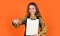 happy teen girl with document folder. happy childhood. pretty child on studio background.