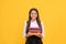 happy teen girl in school uniform hold book stack, reading