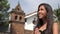 Happy Teen Hispanic Girl Praying at Church