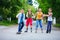 Happy teenage friends playing outdoors