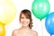 Happy teenage girl with balloons