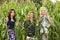 Happy teenage girls in a corn field