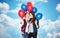 Happy teenage girls with helium balloons over sky